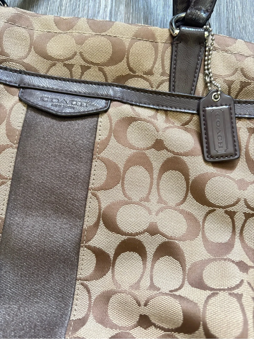 Coach canvas tote shoulder bag with signature Cs brown